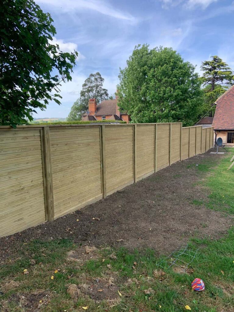 This is a photo of an acoustic fence installed by Fast Fix Fencing Taverham